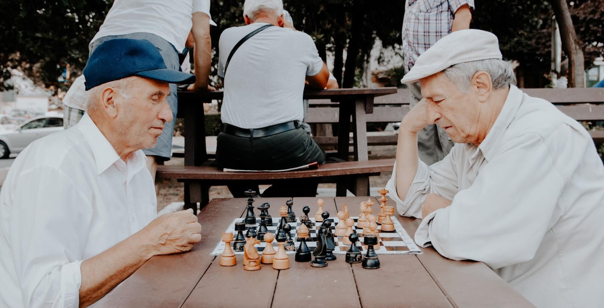 seniors playing chess two seniors playing chess