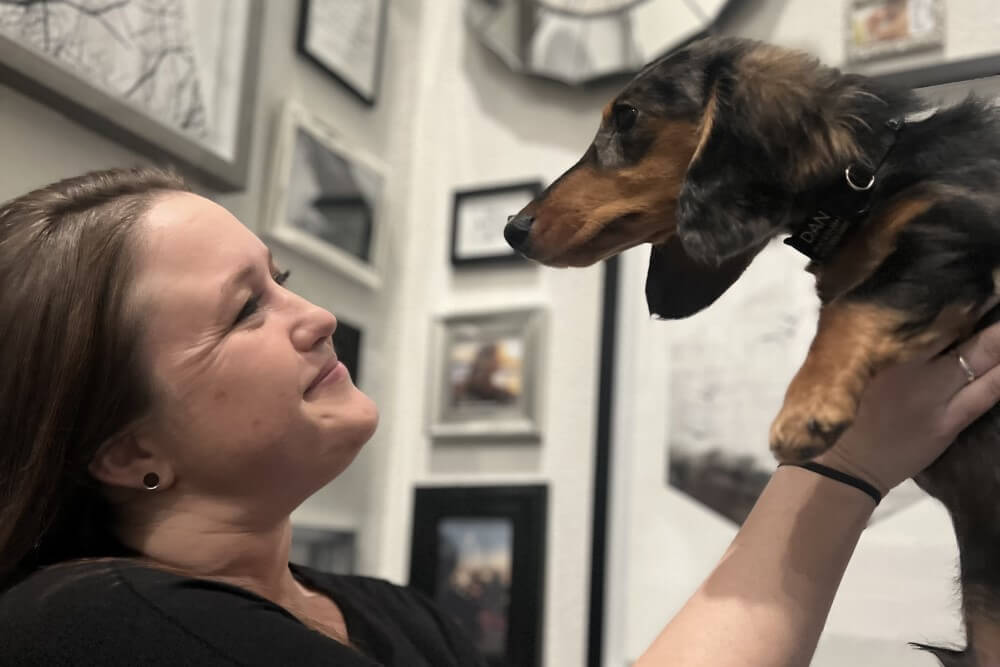 Erica sunset employee with her dog