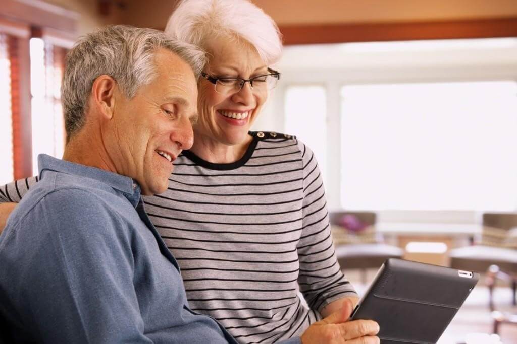 senior couple discussing finances senior couple discussing finances