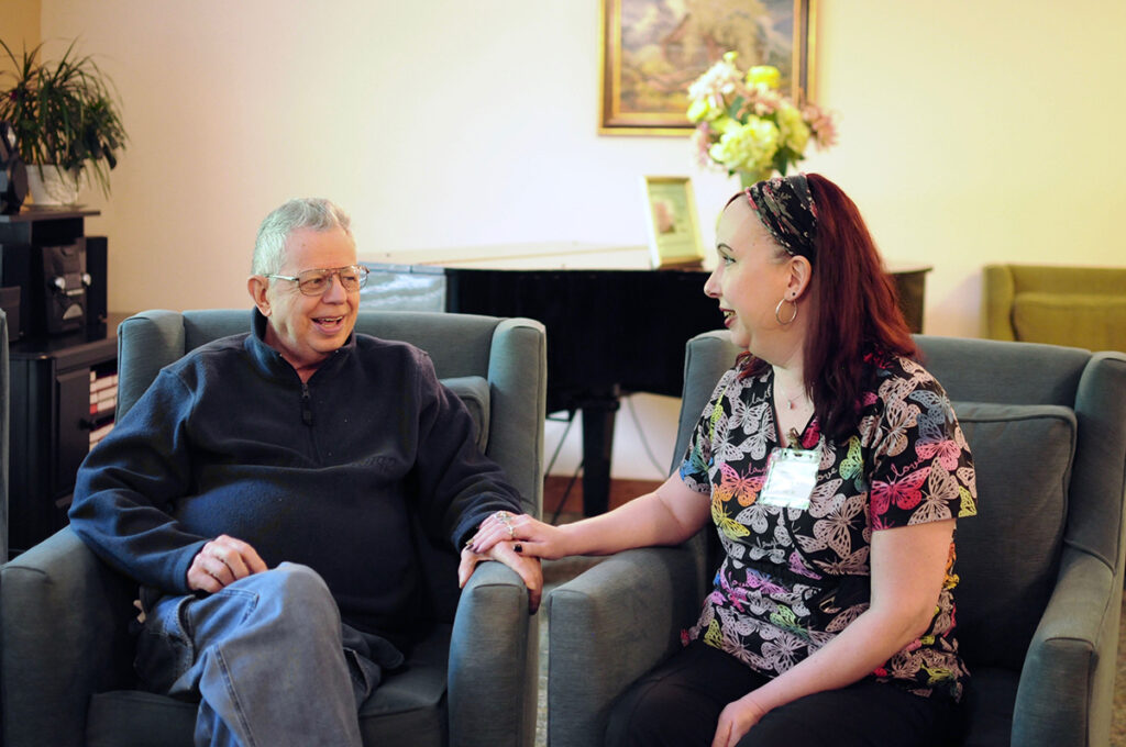 Blog – What is Assisted Living? CH staff member and resident interacting. Blog - What is Assisted Living?