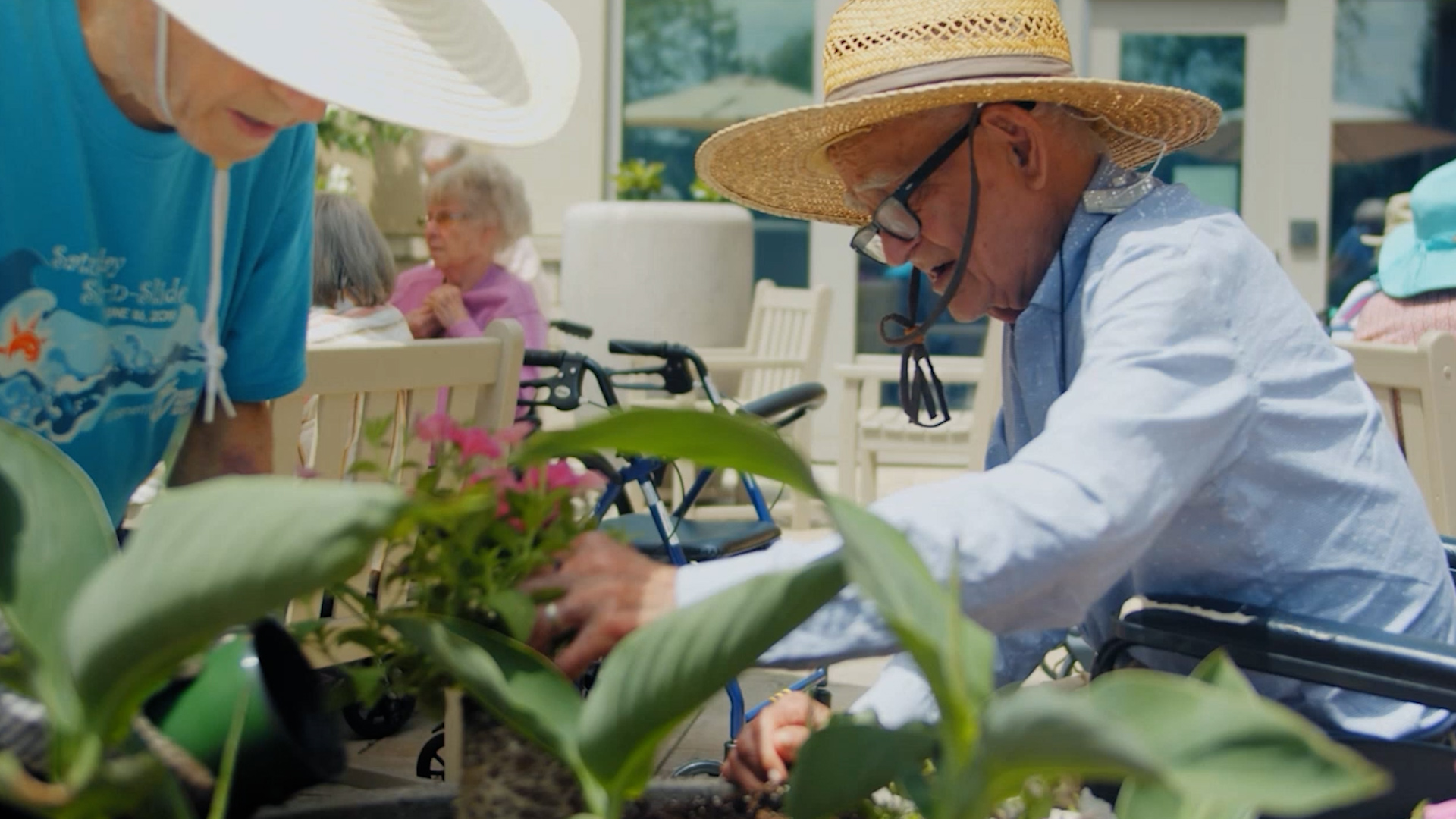 Gardening – 3 memory care residents gardening